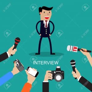 Media conducting a press interview with a businessman